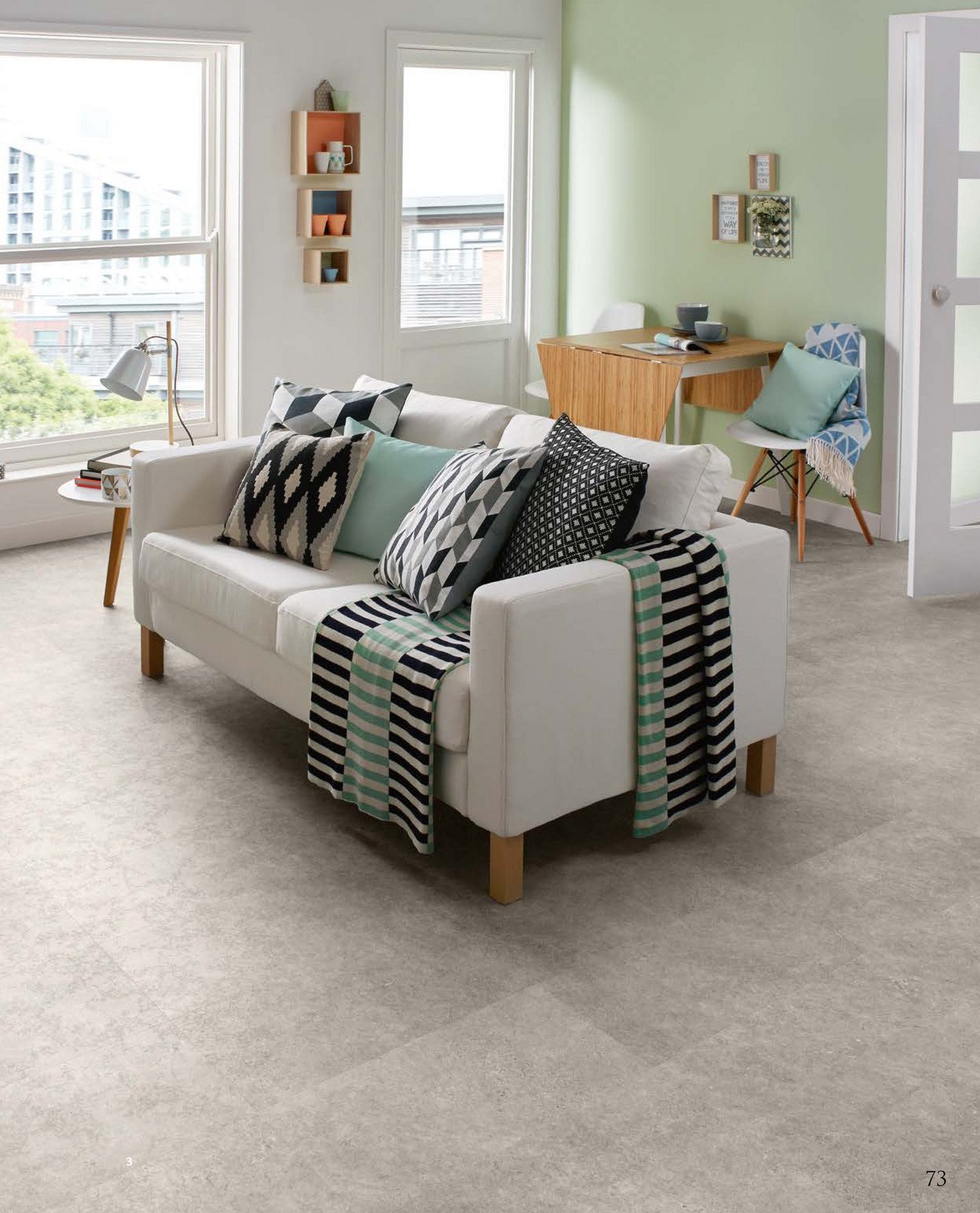 Luxury vinyl flooring in light burnished-concrete colour